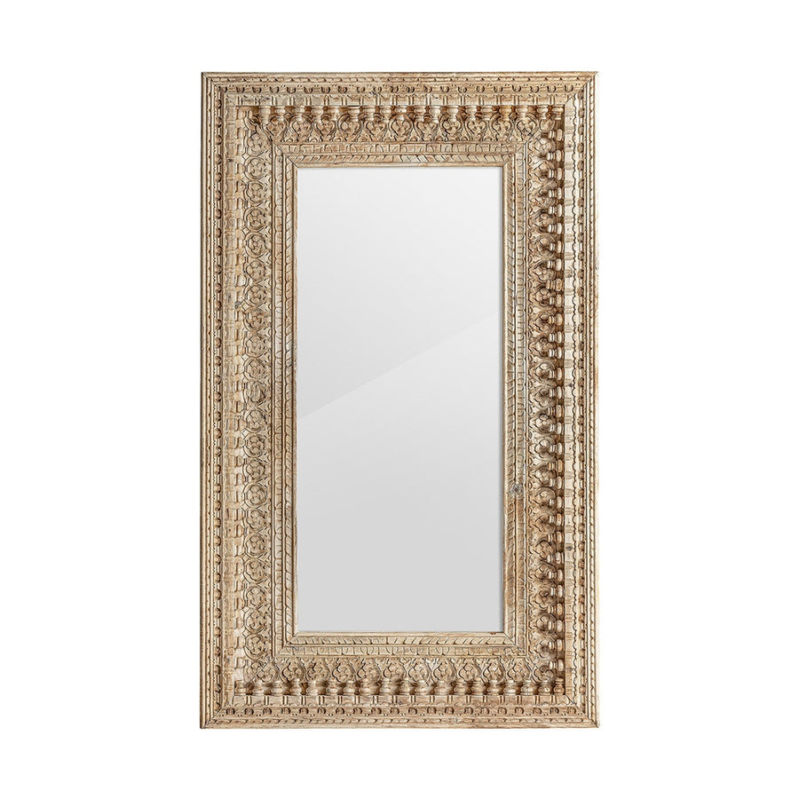Keleti stílusú, dekoratív faragásokkal díszített falitükör mangófakerettel.
