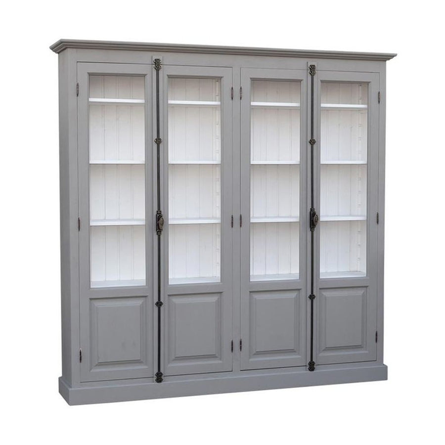 Impozáns fenyőfa könyvszekrény, két darab kétszárnyú ajtóval, melyek mindegyike kétharmad részt üvegezett. A bútor külső színe szürke, belül világos fehér.