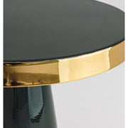 Glamour stílusú, zománcozott acélból készüt, zöld-arany színű, kerek formájú kisasztal.