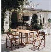 Akácfából készült, változtatható szélességű kerti asztal négy darab székkel.