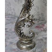 Patinás felületű, 36 cm magas, antik ezüst színű, barokkos jellegű, akantuszleveles gyertyatartó