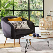 Art Deco stílusú, fekete színű bársonnyal kárpitozott fotel, arany színű fém lábakkal