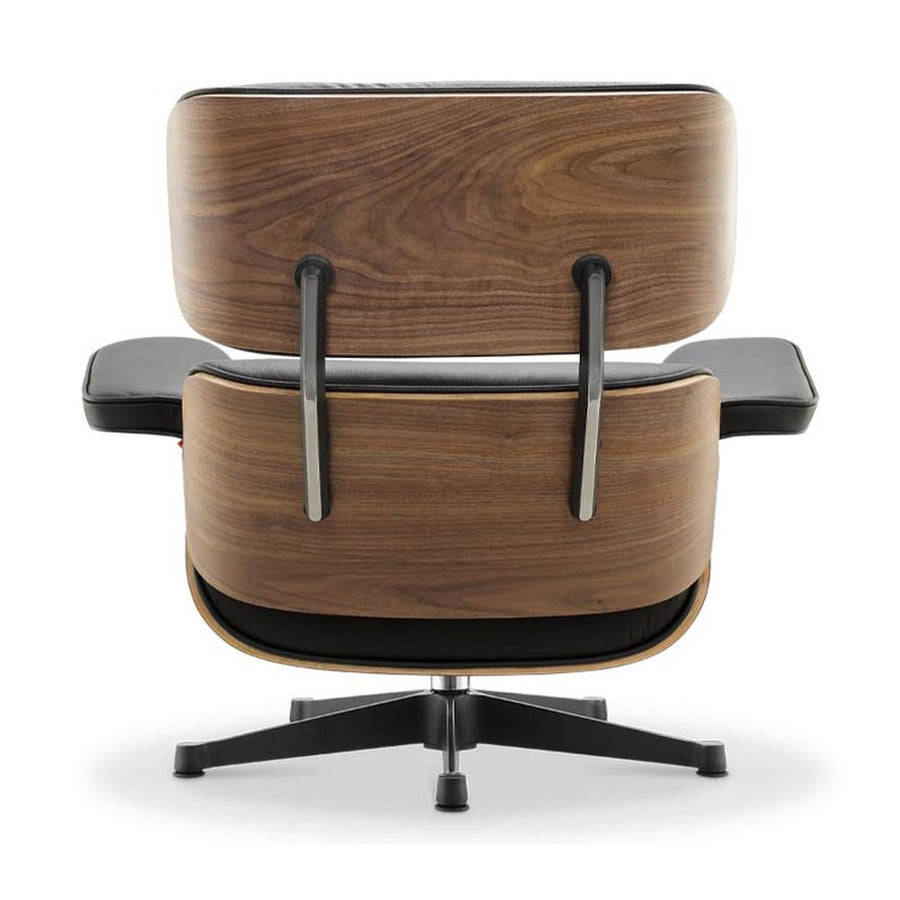 Eames Lounge Chair inspirálta pihenő fotel dió furnér fafelülettel, bőr kárpittal.