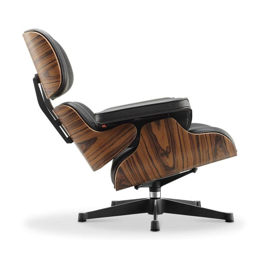 Eames Lounge Chair inspirálta pihenő fotel és ottomán rózsafa furnér fafelülettel, fekete bőr kárpittal.