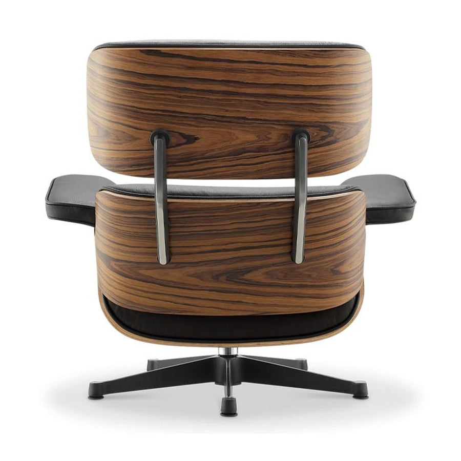 Eames Lounge Chair inspirálta pihenő fotel és ottomán rózsafa furnér fafelülettel, fekete bőr kárpittal.