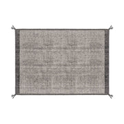 Szürke gyapjú szőnyeg.