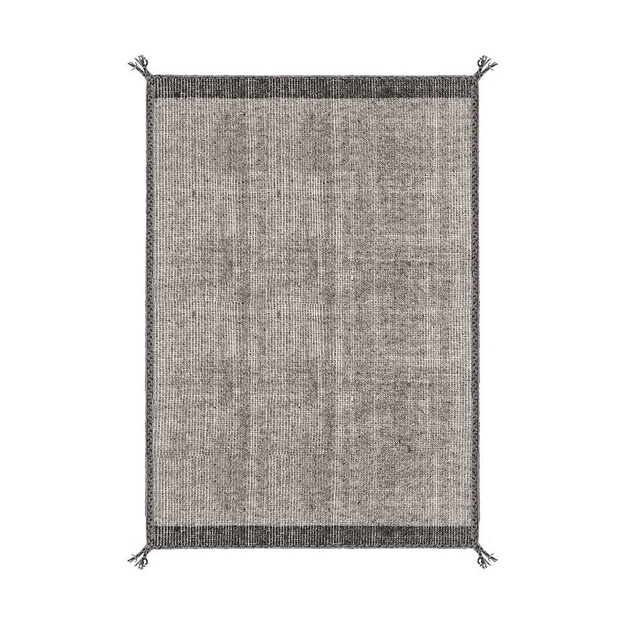 Szürke gyapjú szőnyeg.