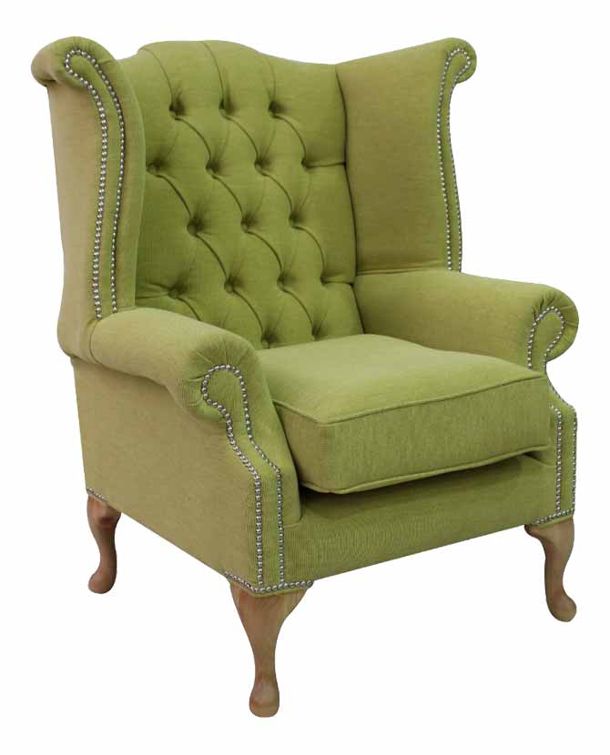 Lime zöld színű szövettel kárpitozott szárnyas Chesterfield fotel.