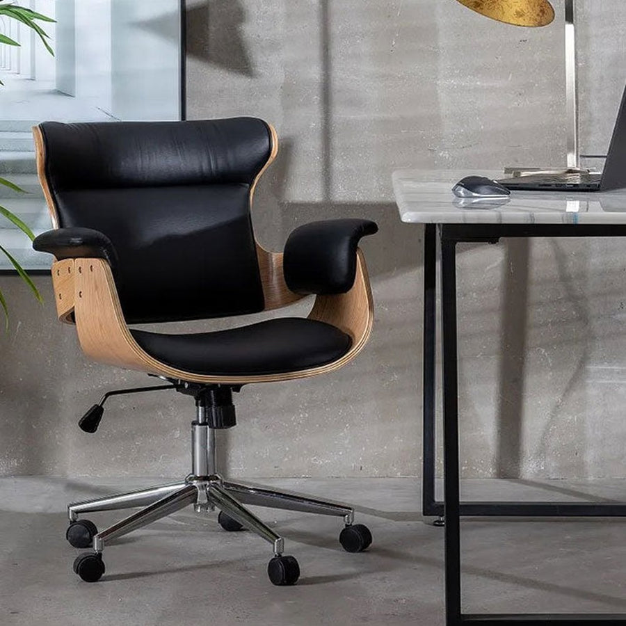 Prémium kategóriás, modern illetve loft stílusú, állítható magasságú, dió furnéros, fekete műbőr kárpitú, kerekes irodai vezetői forgószék