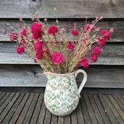 Bokrosan ágas szárú, bordó színű dekorációs díszhagyma művirág