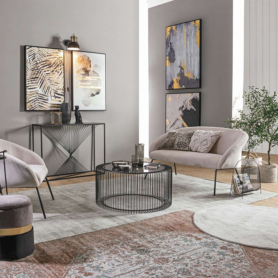 Porfestett, fekete színű acélból készült, sötét színű edzett üvegű, modern, kortárs stílusú kör alakú dohányzóasztal.