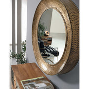 Antikolt felületű, arany színű, kör alakú fém tükör.