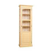Tömör fenyőfából készült, 75 cm hosszú és 220 cm magas, három oldalról üvegezett, egyajtós zárható vitrin-könyvszekrény