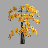 Sárga színű mű orchidea, mesterséges földlabdában.