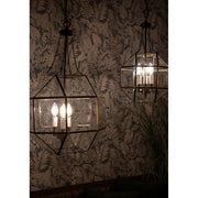 Aranyszínű fémből és víztiszta üvegből készült, 30 cm átmérőjű, rombikuboktaéder formájú, beltéri függesztek lámpa.