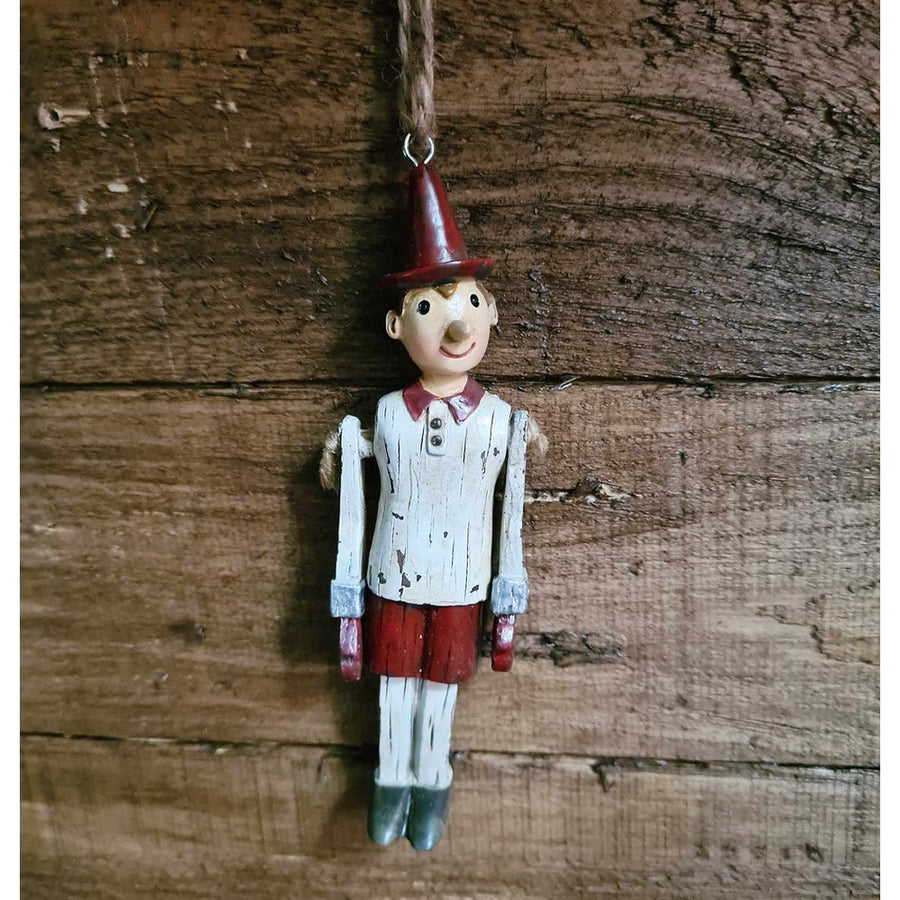 Vintage stílusú, 12 cm magas, fa hatású, függeszthető Pinokkió-figura.