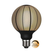 A GRAPHIC dekor izzók jellegzetessége az opálos üvegfelületeiket díszítő, matt fekete színű dekoratív grafikai minták alkalmazása