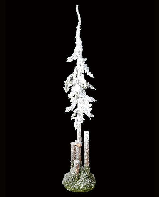 Havas felületű, 115 cm magas, mesterséges dekorációs műfenyőfa, valódi fából készült törzzsel fekete háttér előtt