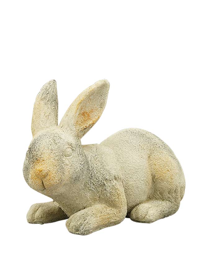 Rusztikus vidéki stílusú, 22 cm hosszú és 15 cm magas, antikolt felületű, krém színű húsvéti nyuszi figura.