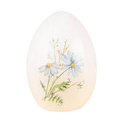 Mezei virágokkal díszíttetett húsvéti kerámia tojás.