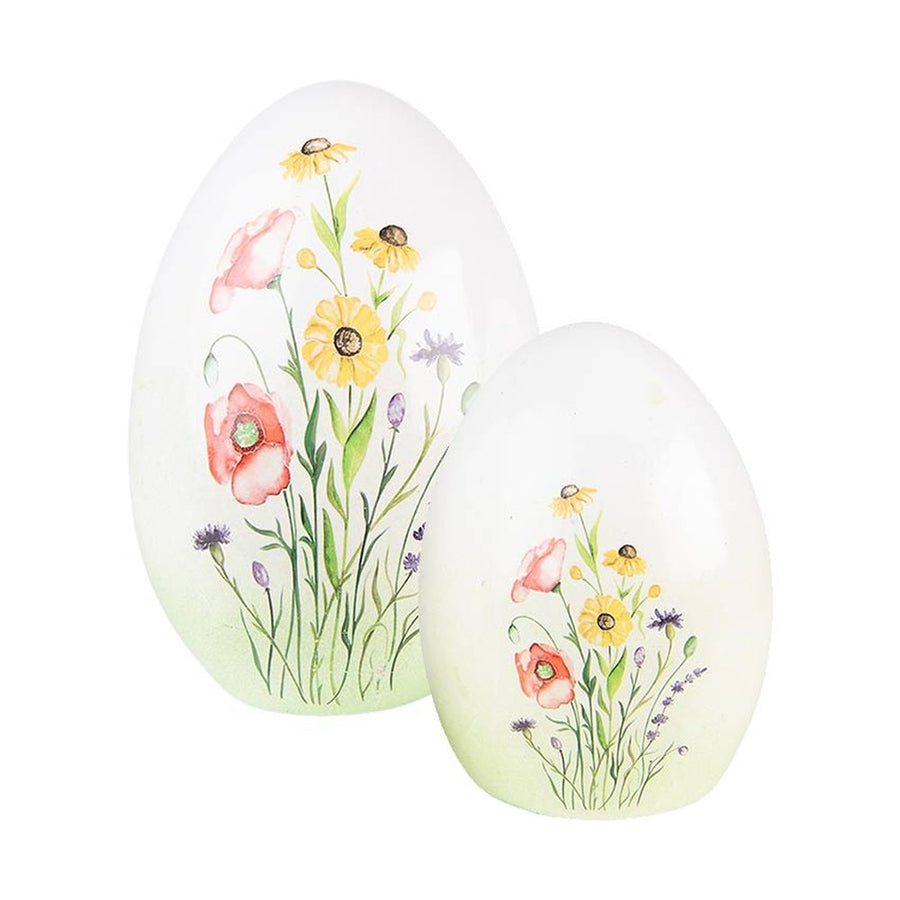 Mezei virágokkal díszíttetett húsvéti kerámia tojás.