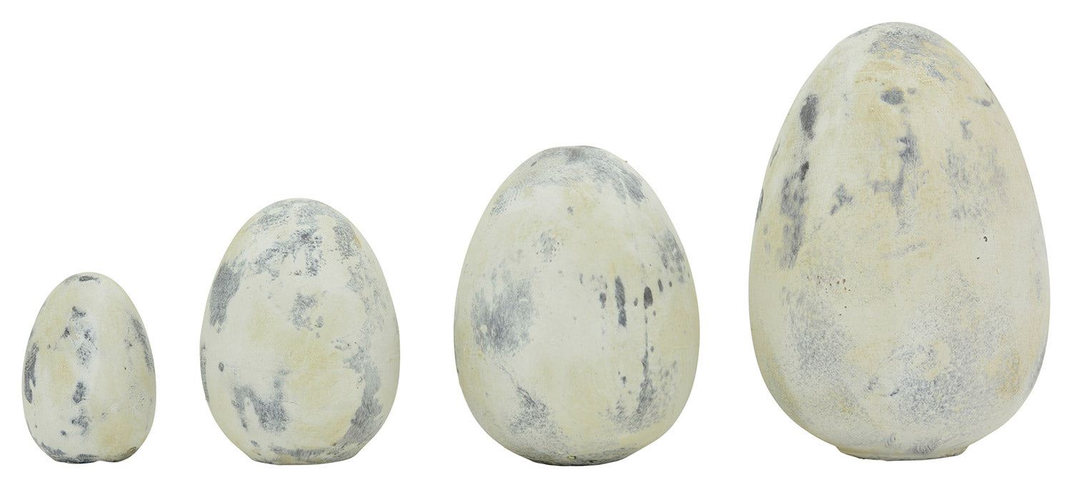 4 féle méretű, antikolt felületű, krém színű húsvéti kerámia tojások.