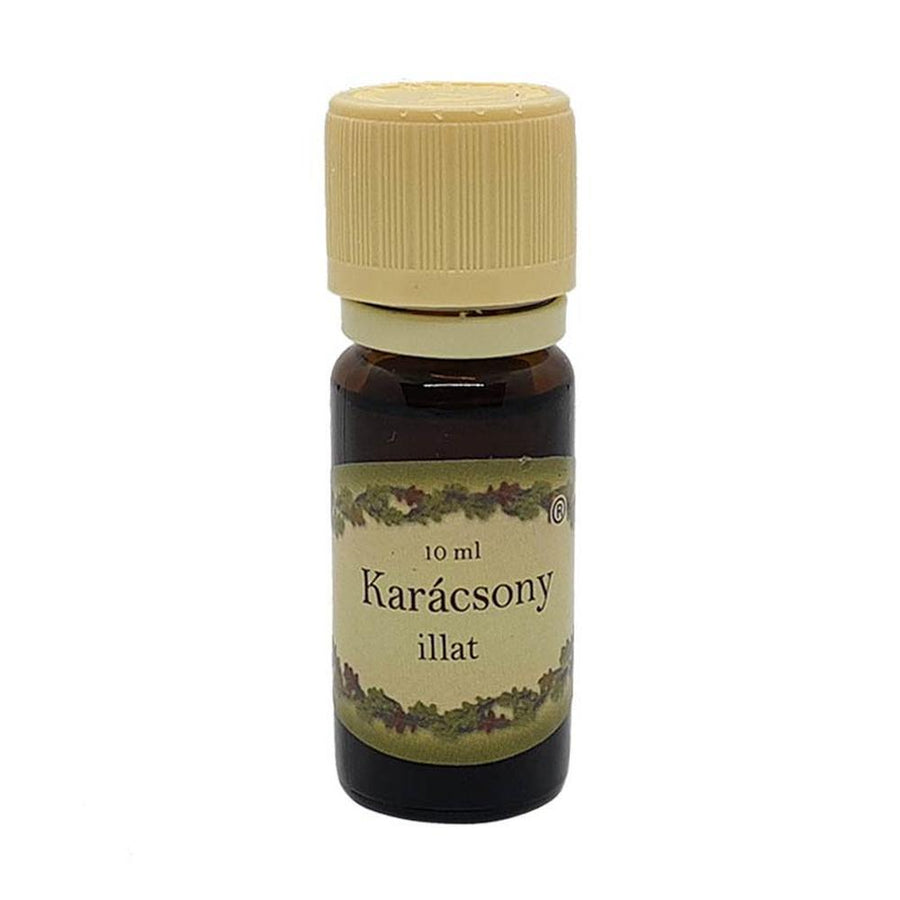 Karácsony illatú illóolaj 10 ml-es barna üvegcsében, fűszeres aromakeverék az ünnepi hangulat megteremtéséhez, krémszínű kupakkal.