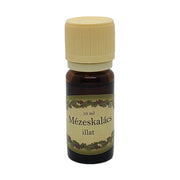 Mézeskalács illatú illóolaj 10 ml-es barna üvegben, krémszínű kupakkal, ünnepi hangulatot idéző édes-fűszeres aromával, párologtatóhoz.