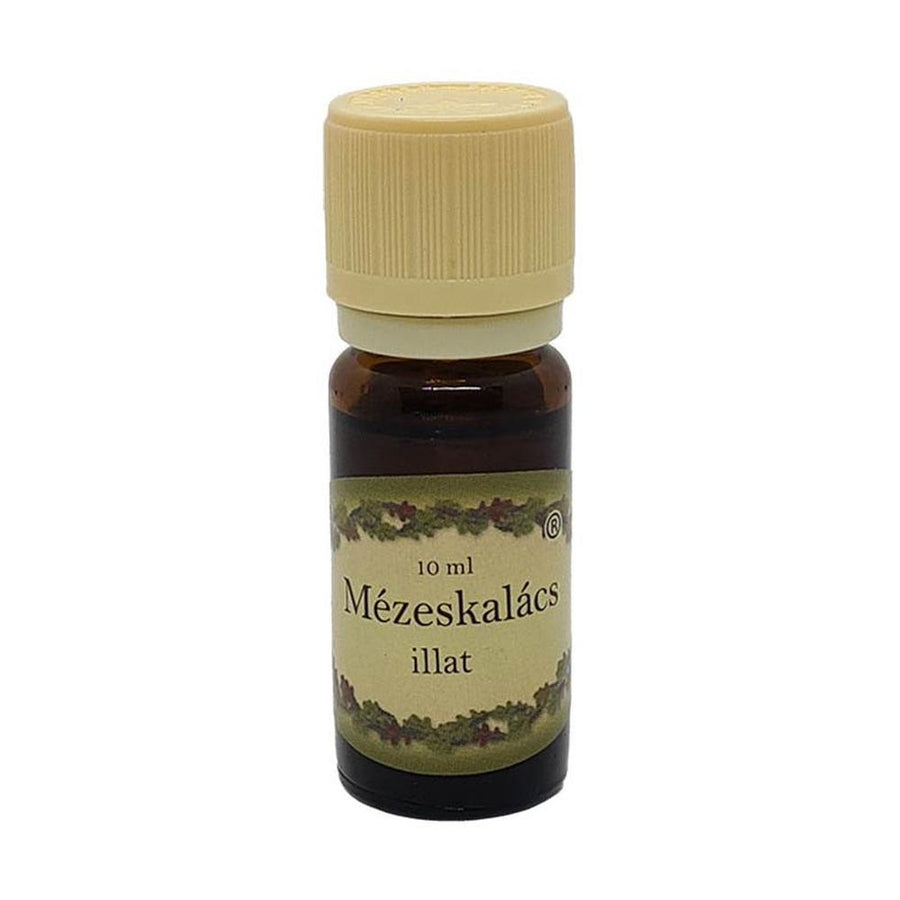 Mézeskalács illatú illóolaj 10 ml-es barna üvegben, krémszínű kupakkal, ünnepi hangulatot idéző édes-fűszeres aromával, párologtatóhoz.