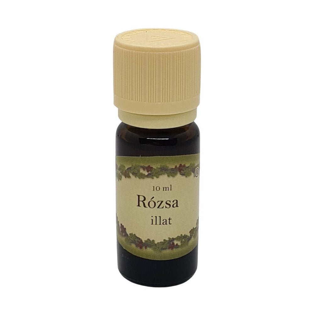 Rózsa illatú illóolaj 10 ml-es barna üvegcsében, bézs kupakkal – klasszikus, elegáns virágillat párologtatáshoz.