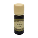 Rózsa illatú illóolaj 10 ml-es barna üvegcsében, bézs kupakkal – klasszikus, elegáns virágillat párologtatáshoz.