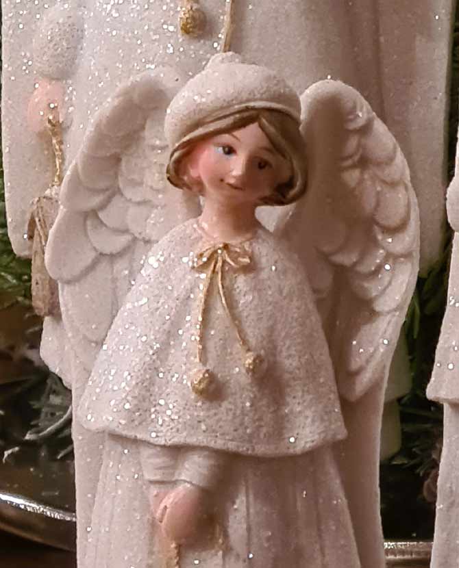 Fehér színű, glitteres felületű, karácsonyi angyalka aranyszínű csillaggal a kezében