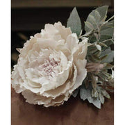 Deres felületű, 20 cm hosszú, mesterséges, barack színű ünnepi bazsarózsa pick bársony kanapén 