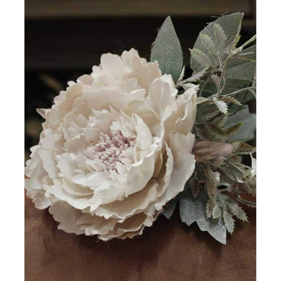 Deres felületű, 20 cm hosszú, mesterséges, barack színű ünnepi bazsarózsa pick bársony kanapén 