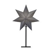 Modern, skandináv stílusú, 55 cm magas, szürkeszínű papírból készült, csillag formájú karácsonyi dekorációs lámpa fém talapzaton.