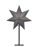 Modern, skandináv stílusú, 55 cm magas, szürkeszínű papírból készült, csillag formájú karácsonyi dekorációs lámpa fém talapzaton.