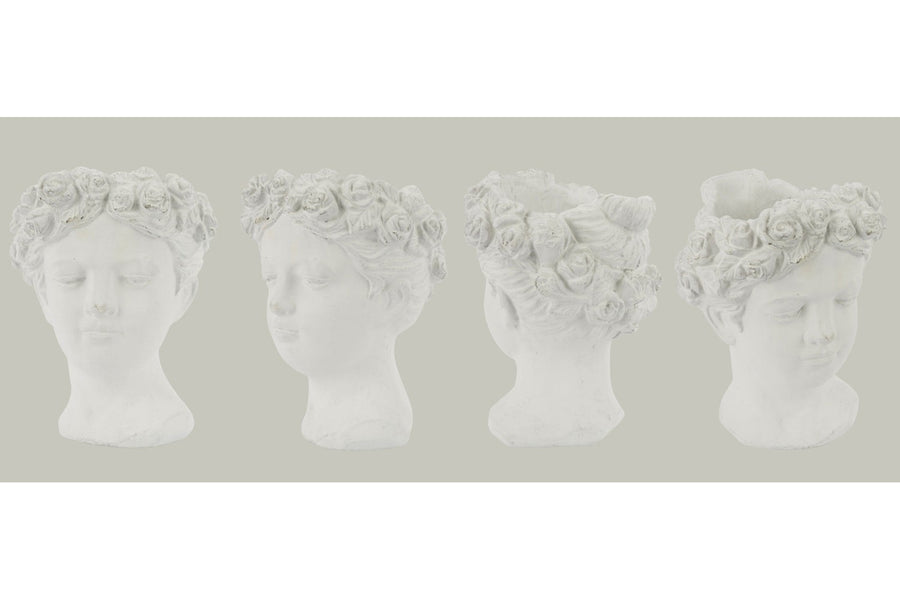 Antikolt felületű, krém színű kaspó büszt.