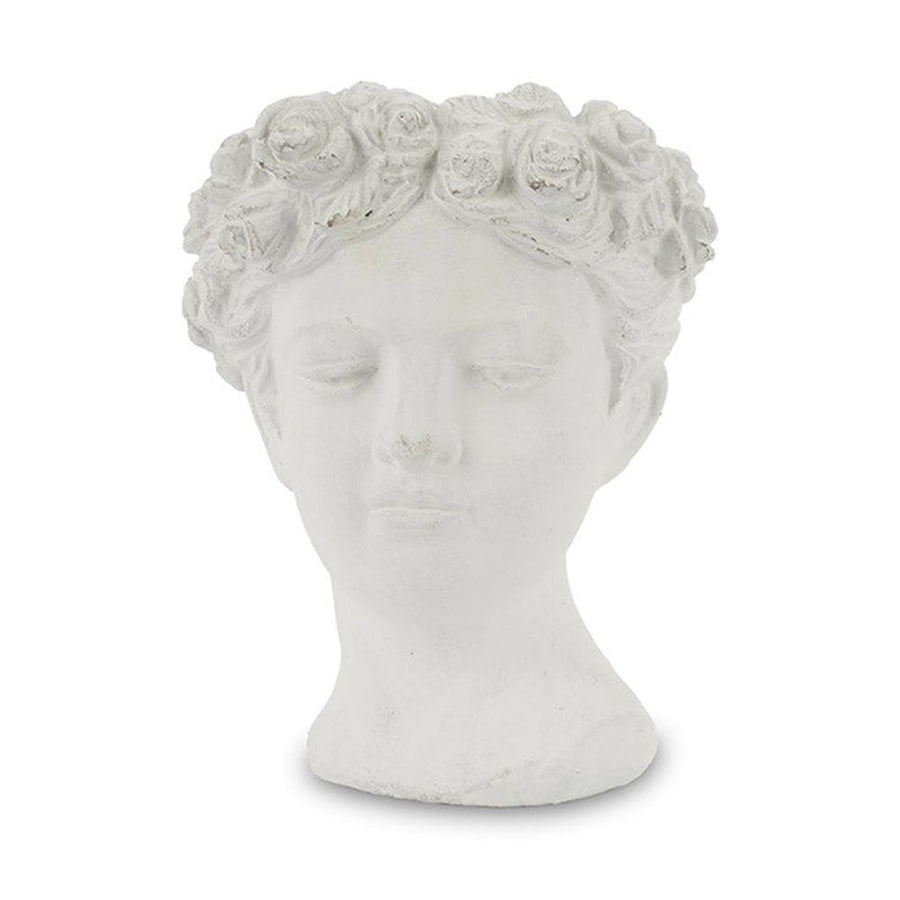 Antikolt felületű, krém színű kaspó büszt.