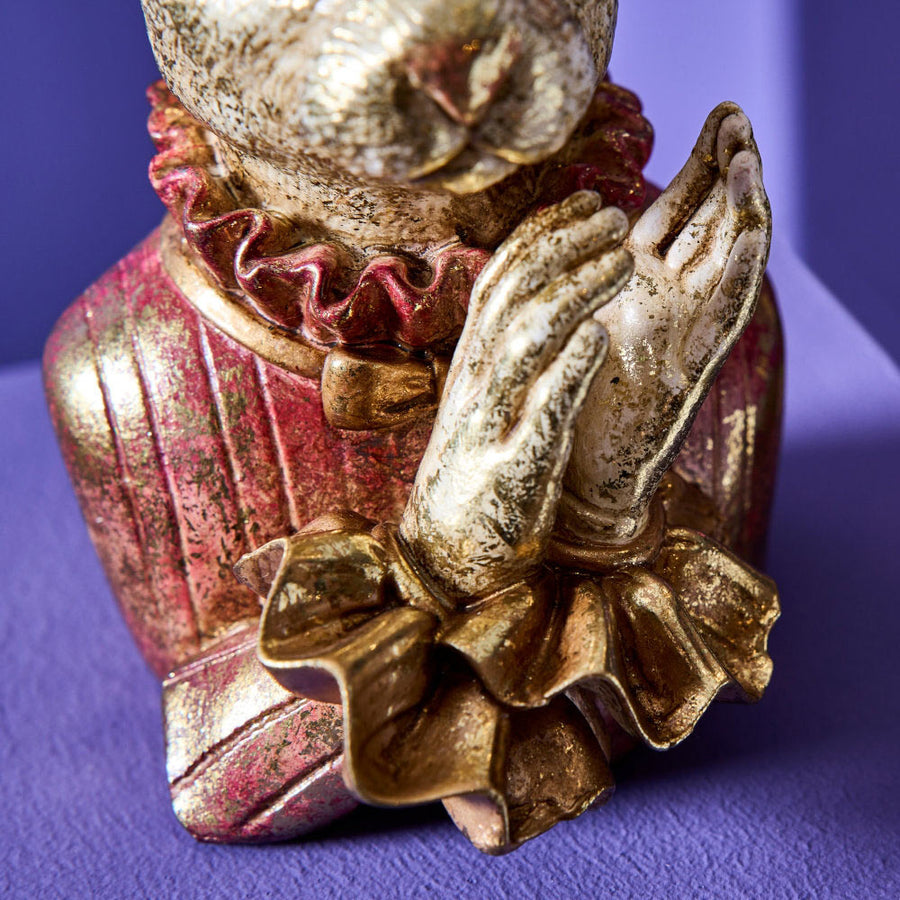 Antikolt felületű, arany masnival díszített, galléros nyuszi lány mellszobor.