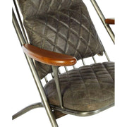 Vasból készült, vintage ébenfa színű marhabőrrel kárpitozott, kortárs-loft stílusú, formatervezett prémium pihenő karosszék.