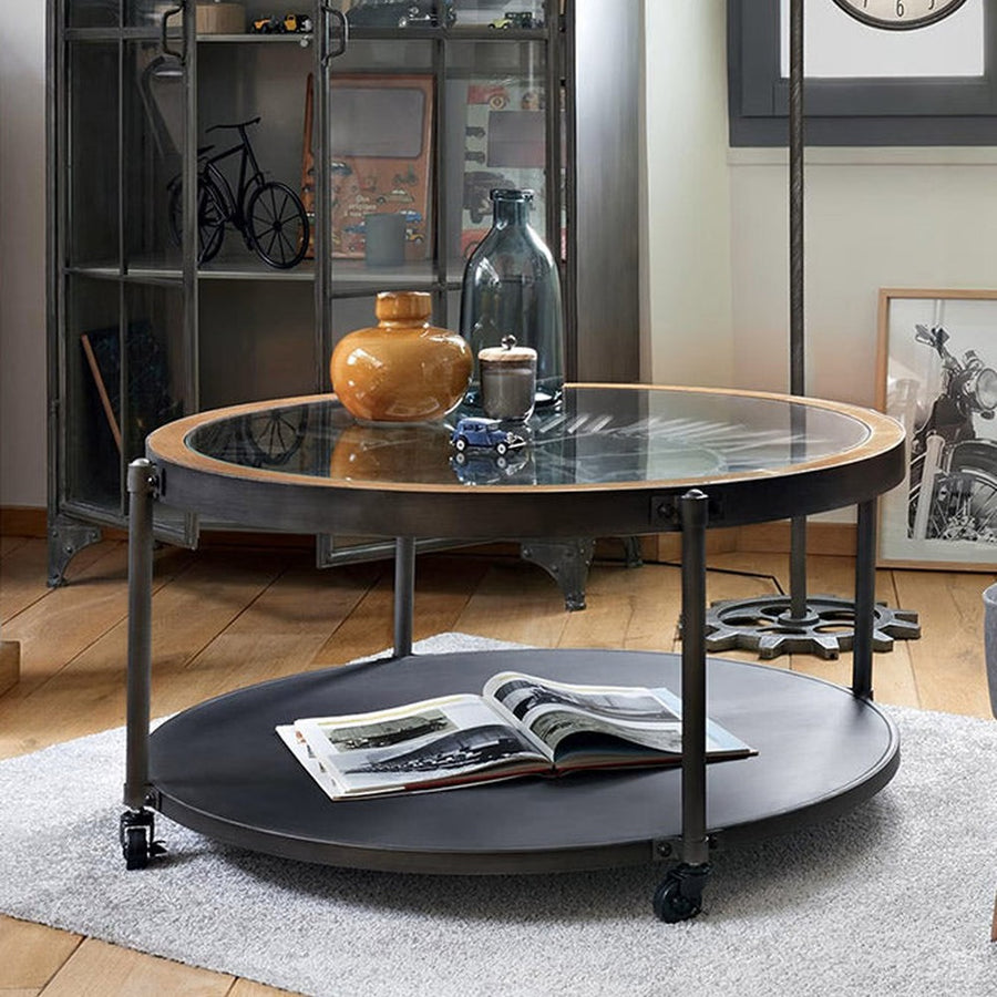 Impozáns méretű, 90 cm átmérőjű, fémből, fenyőfából és edzett üvegből készült, kerekekkel ellátott, loft stílusú dohányzóasztal