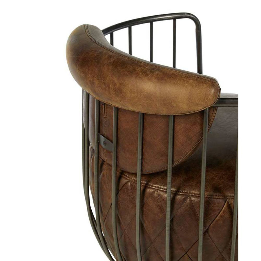 Vasból készült, 360 fokban körbe forgatható, vintage barna színű marhabőrrel kárpitozott, kortárs-loft stílusú, formatervezett prémium klubfotel.