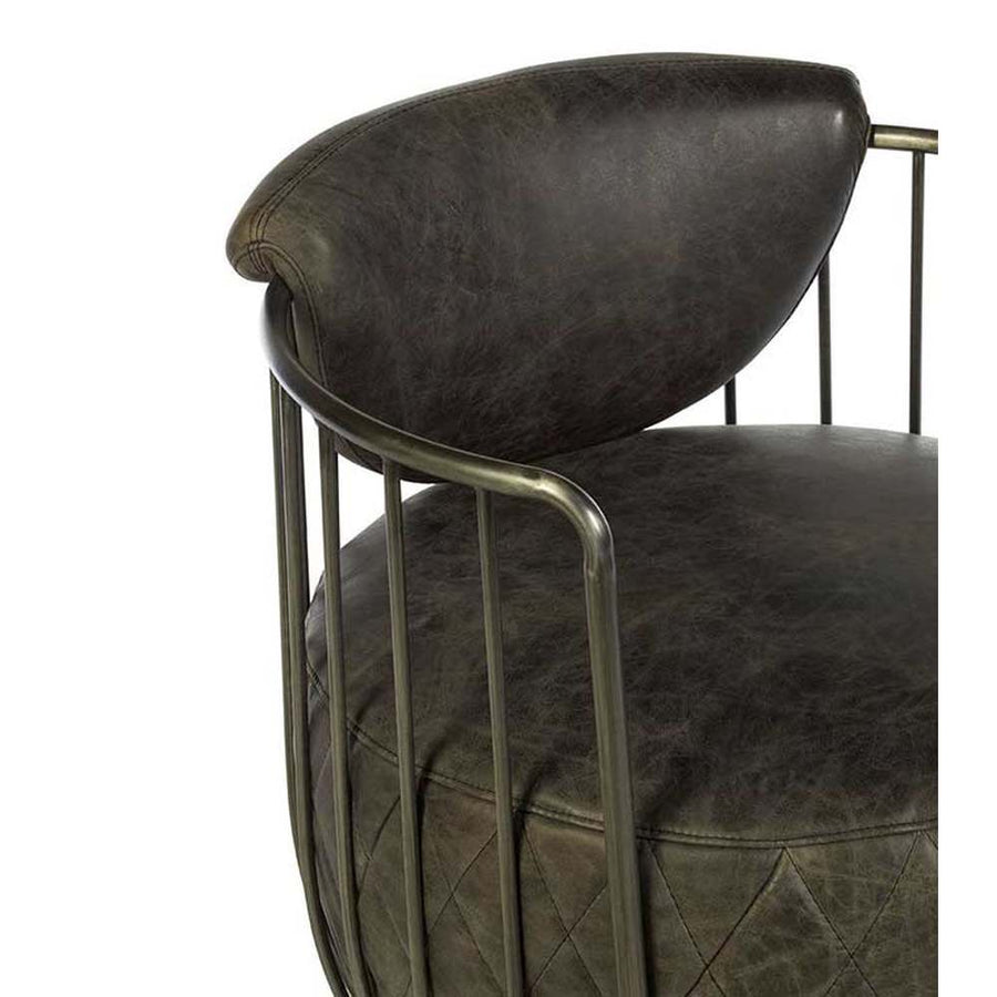 Vasból készült, 360 fokban körbe forgatható, ébenfa színű marhabőrrel kárpitozott, kortárs-loft stílusú, formatervezett prémium klubfotel.