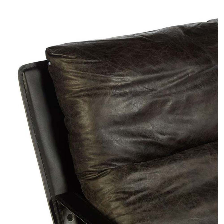 Natúr színű vasból készült, sötétbarna színű marhabőrrel kárpitozott, kortárs-loft stílusú, formatervezett prémium pihenő fotel .