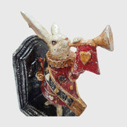 Harsonás nyuszi figurás könyvtámasz.