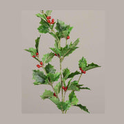 Mesterséges piros bogyós karácsonyi magyal ág, zöld színű levelekkel.