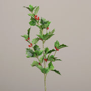 Mesterséges piros bogyós karácsonyi magyal ág, zöld színű levelekkel.