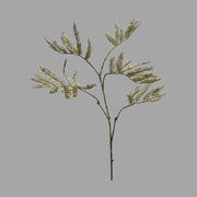 Zöld-arany színű mű cikász pálma ág.