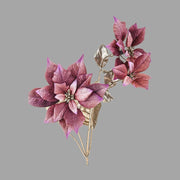 Mű mikulásvirág ág, fényes pezsgőszínű szárral és levelekkel, mályva színárnyalatú virágfejekkel.