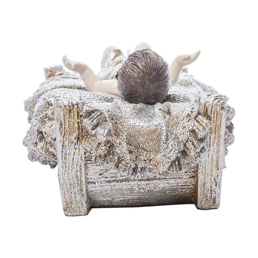 Karácsonyi betlhem kis Jézus figurája jászolban